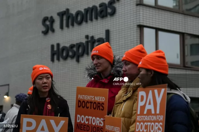 UK doctors begin strike over low pay, jobs